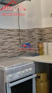 VANDUTA !!! Garsoniera in Onesti, zona Kaufland, etaj 2. - foto 9