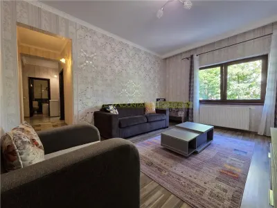 Apartament central cu acces la gradina si 2 locuri parcare - foto 4