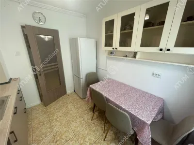 De inchiriat apartament cu 3 camere decomandate si balcon in zona Vasile Aaron din Sibiu - foto 12